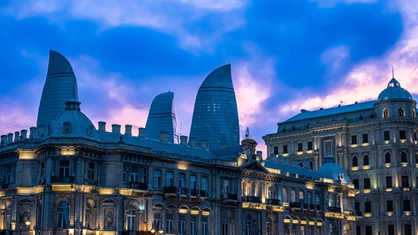 Baku skyline with the Flame Towers at sunset