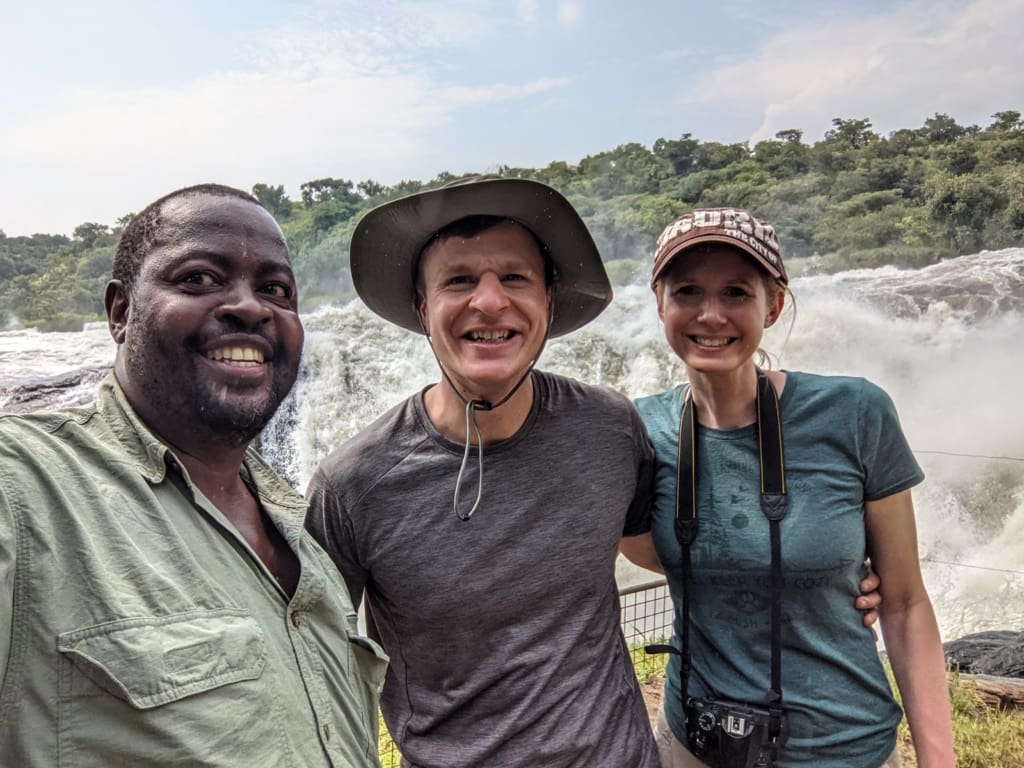 Our guide Emma and us in Uganda on our African safari in Murchison Falls