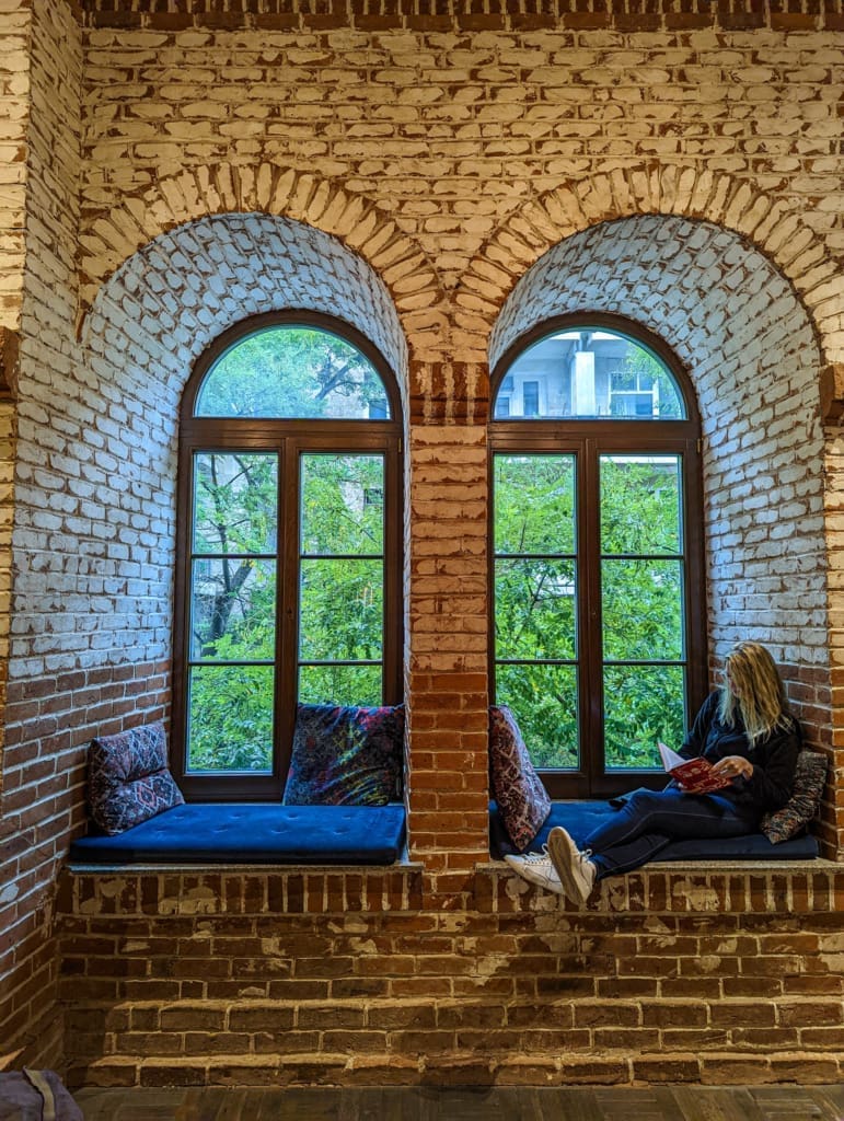 Katarina reading a book at the Baku Book Center